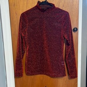 A beautiful red glitter see through top